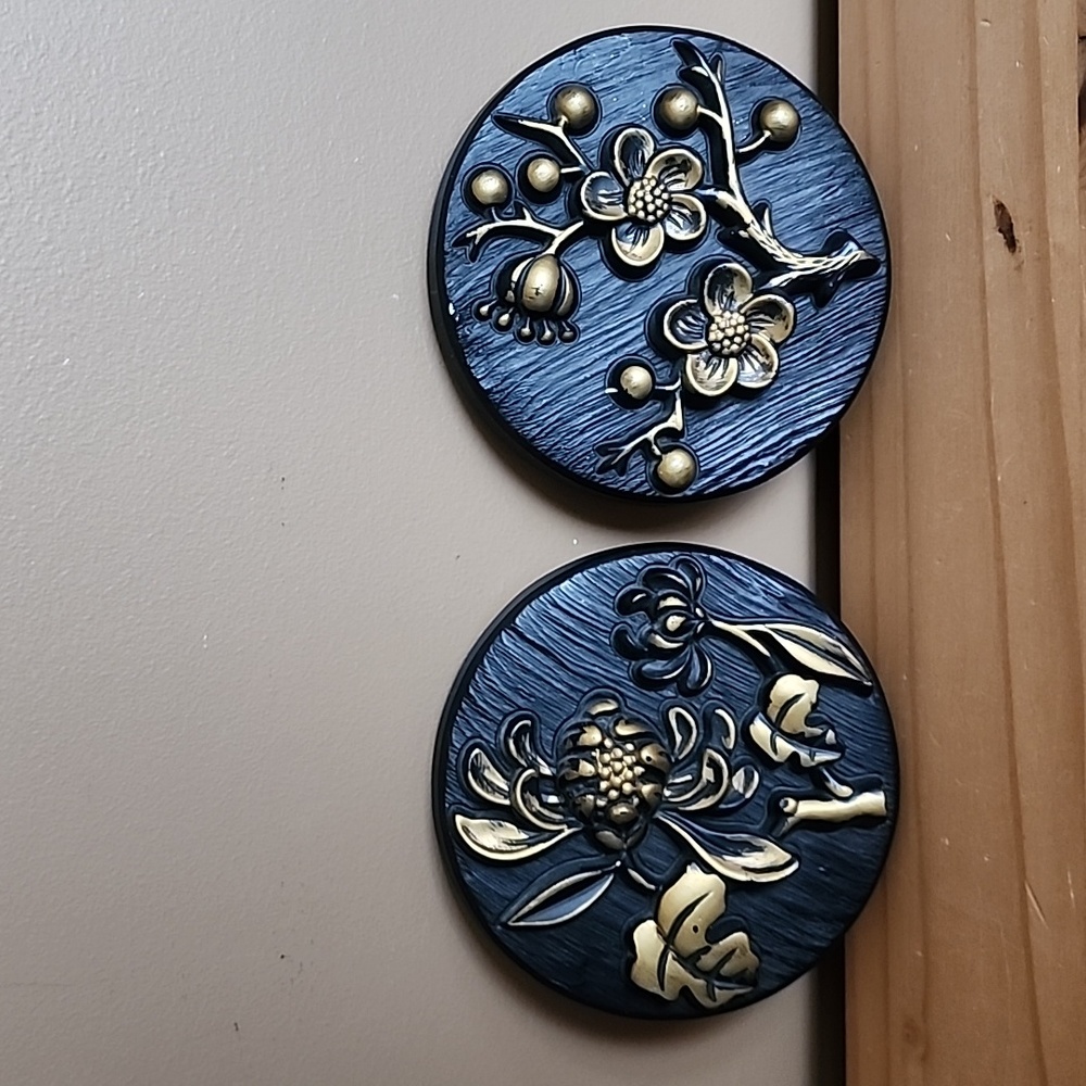 Vintage floral black and gold chalkware wall plaques